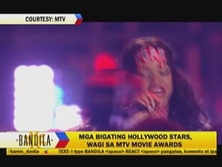 Zac Efron goes topless at MTV Movie Awards