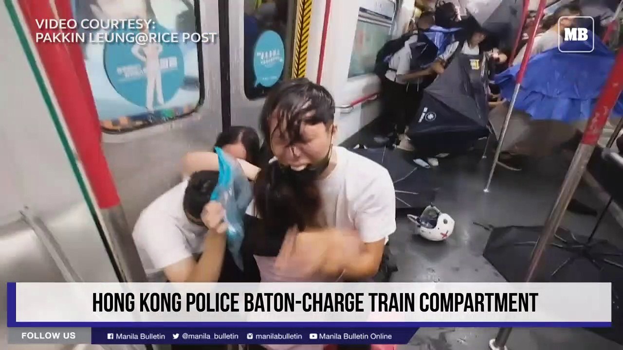 Hong Kong police baton-charge train compartment