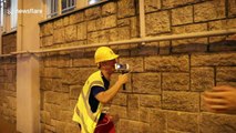 Harrowing moment Hong Kong police officer and journalist both feel terrible effects of tear gas