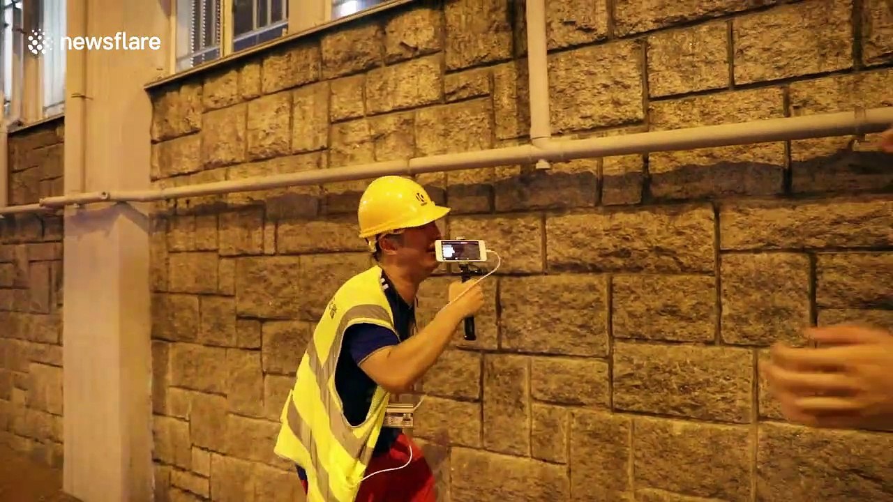 Harrowing moment Hong Kong police officer and journalist both feel terrible effects of tear gas