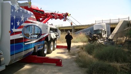 Semi goes over side of bridge on Golden State Highway, into canal