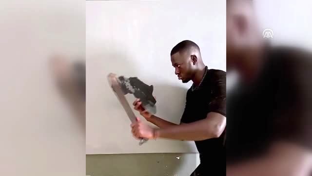 Güney Afrika'daki şiddete, gözü yaşlı Mandela resmi ile tepki