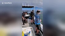 Hook, line and sinker! Prankster dad hilariously fools kids on fishing trip
