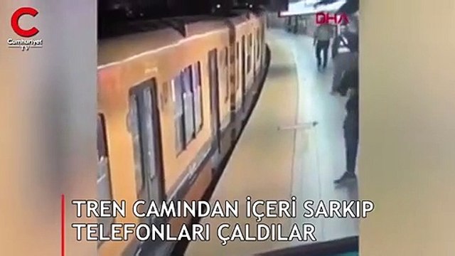 Tren camından içeri sarkıp telefonları çaldılar
