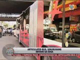 MRT passengers try 'articulated bus' on EDSA