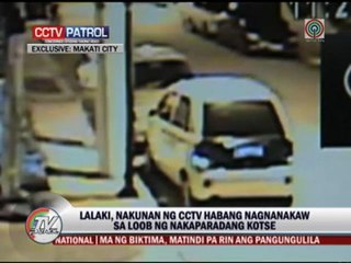 WATCH: Robber smashes glass of parked car