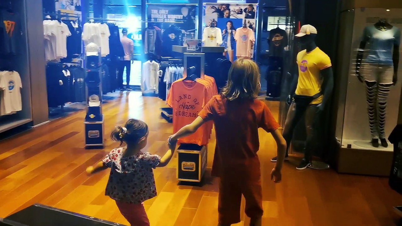 Little Mia and Oleg playing guitar in Hardrock Cafe Dubai