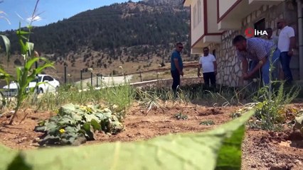 Arazileri baraj suları altında kalan köylüler için yapılan evler teslim edildi