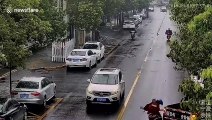 Scooter rider saved by helmet after car runs over her head in China