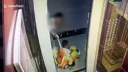 Chinese toddler thrown out of toy car after rope attached gets stuck in elevator