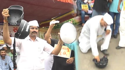देखें वीडियो, नए ट्रैफिक नियमों से गुजरात में भड़के लोग, हेल्मेट तोड़कर फेंकने लगे