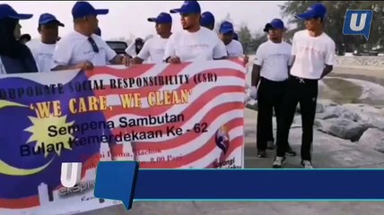 Kakitangan Ekspres Perdana bersih Pantai Irama