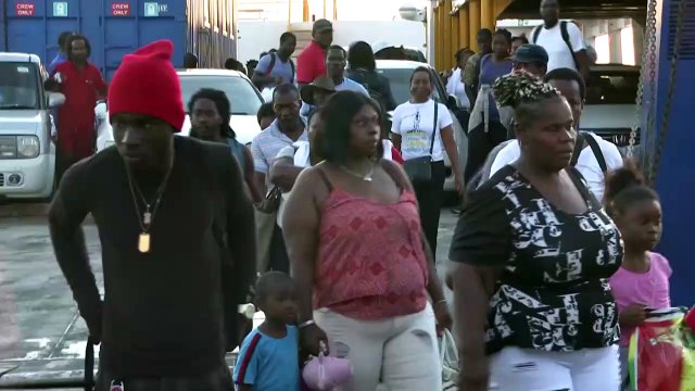 Bahamas' Dorian survivors reach capital via boats