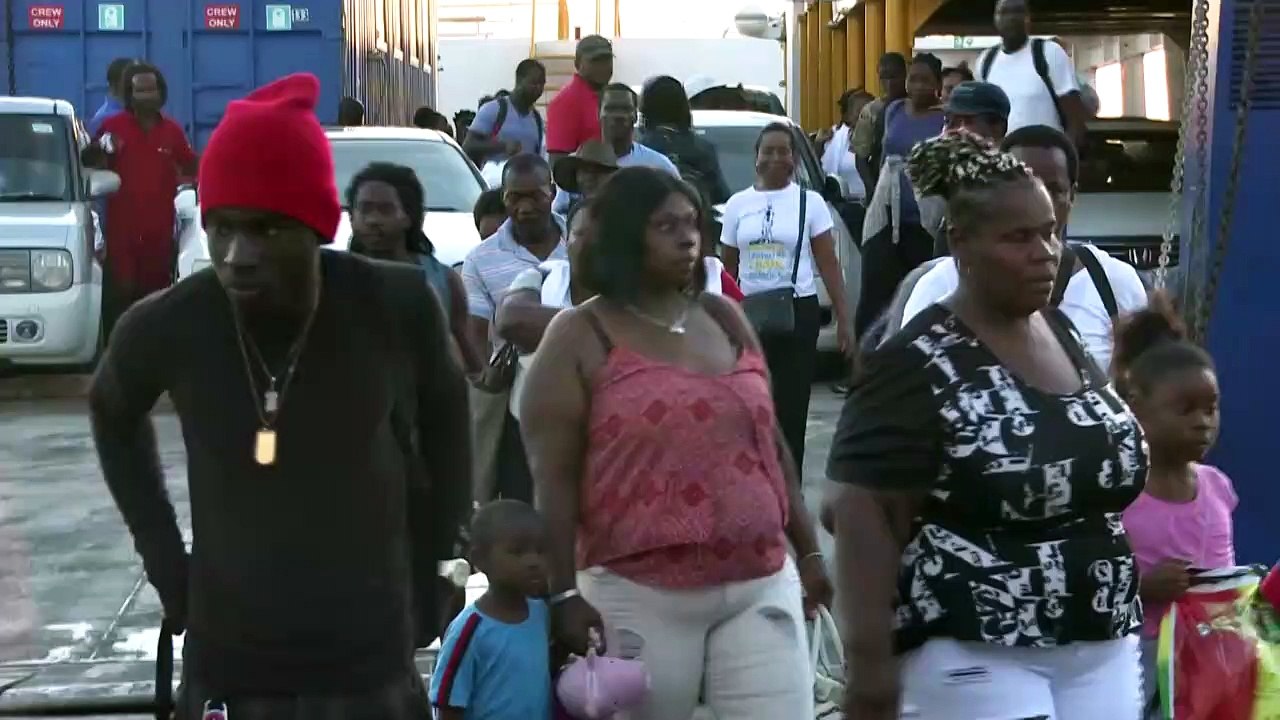 Bahamas' Dorian survivors reach capital via boats