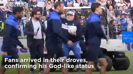 Argentina's football legend Diego Maradona makes comeback as new coach of La Plata's Gimnasia club