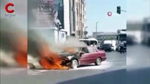 Otomobil alev aldı, patlama seslerine rağmen söndürmeye devam etti