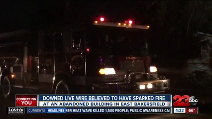 Crews battling fire on Alta Vista after building goes up in flames