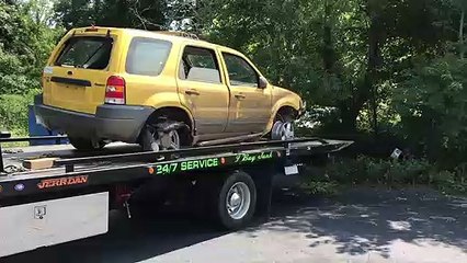 Unloading a Tow Truck