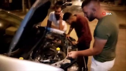 Arabanın motor kısmına sıkışan kediyi itfaiye kurtardı