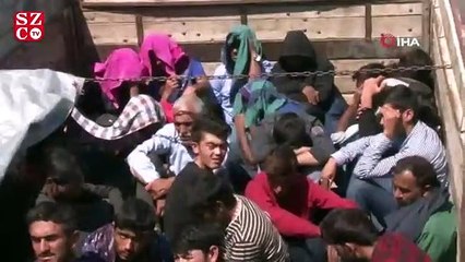 Kamyon kasasından 61 kaçak göçmen çıktı