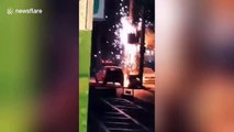 Faulty voltage transformer explodes sending sparks onto Chinese street