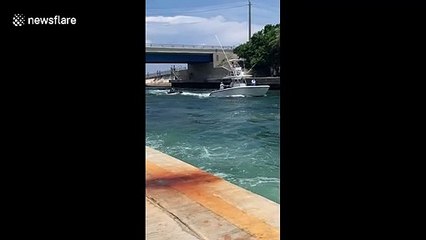 Two men rescued after boat sinks in the Boynton Inlet, Florida