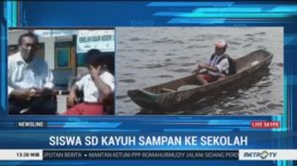 Bocah SD Ini Kayuh Sampan Seberangi Danau Demi Bersekolah