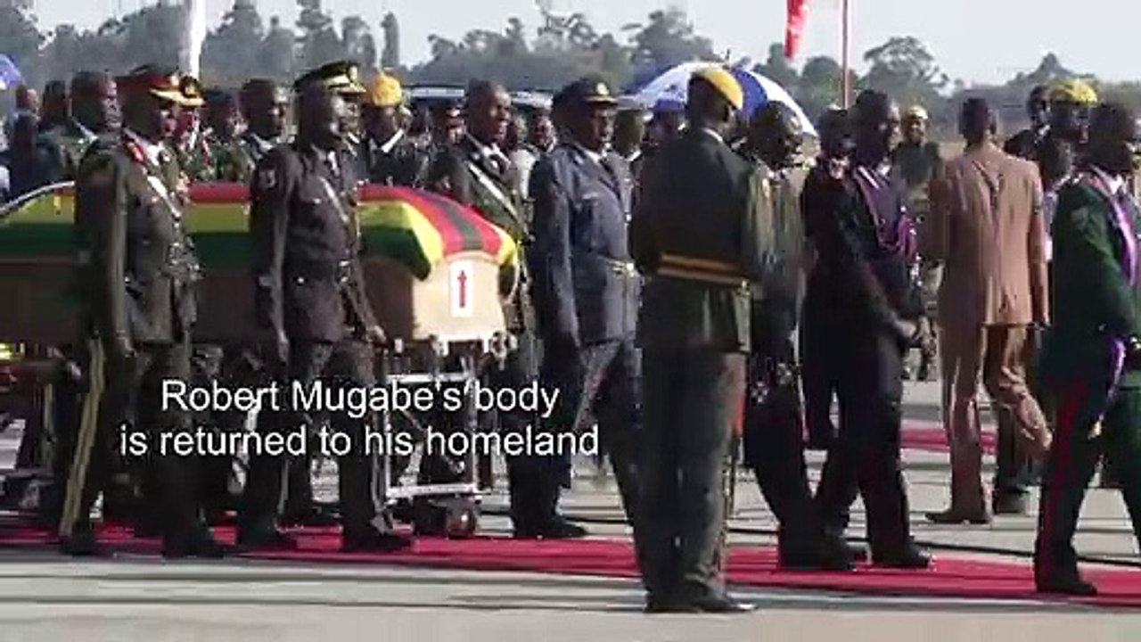 Mugabe's body arrives home for burial in divided Zimbabwe