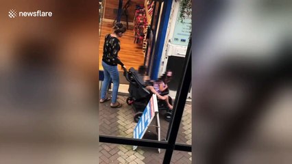 Horrifying moment Northampton woman caught choking young girl in stroller