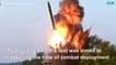 N.Korea releases photos of 'super-large' rocket launcher tests