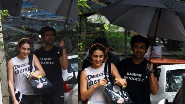 Sara Ali Khan को बारिश से बचाने छाता लेकर पहुंचे Kartik Aaryan | FilmiBeat