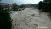 Floodwaters race downstream after torrential rainfall