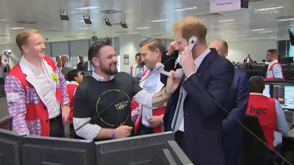 Prince Harry Takes Calls at the Annual BGC Charity Day
