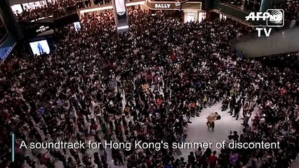 HK demonstrators rock new protest anthem