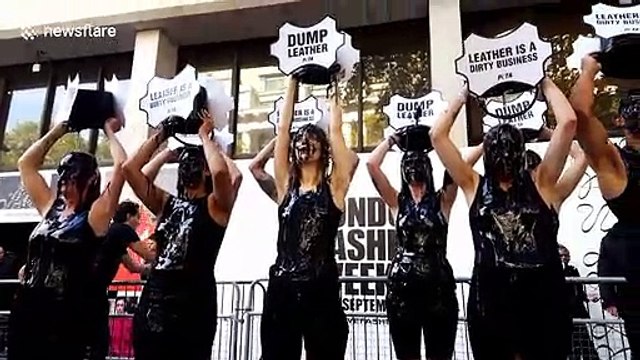 PETA activists cover themselves in 'toxic slime' during protest at London Fashion Week