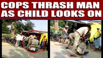 Cops thrash man for violating traffic rules as child looks on | Oneindia News