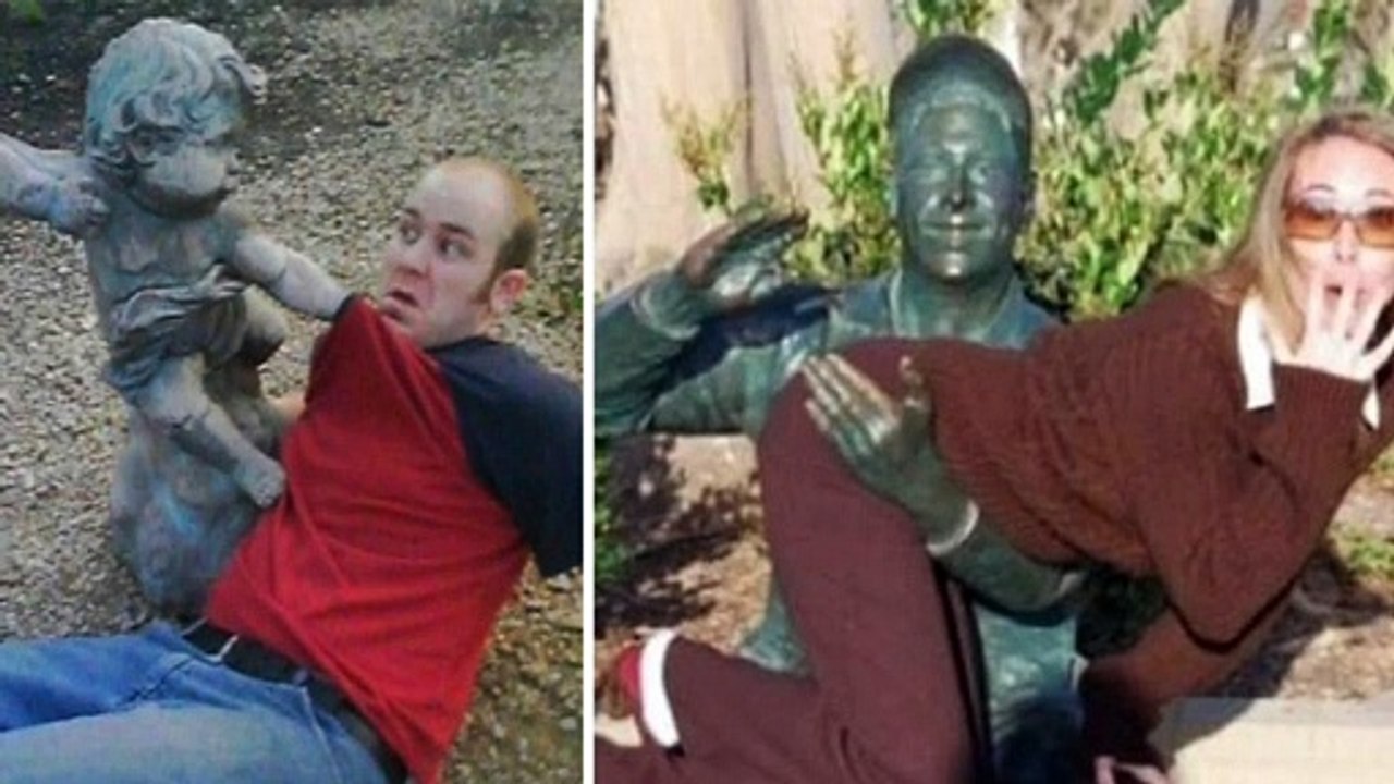 People having fun with statues