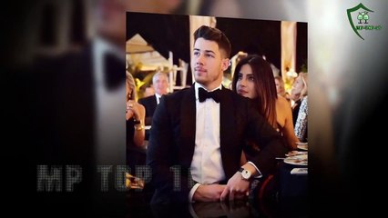Nick Jonas taking care of PREGNANT Priyanka Chopra and making her happy at an event