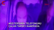 Müşterisinin telefonlarını çalan taksici kamerada