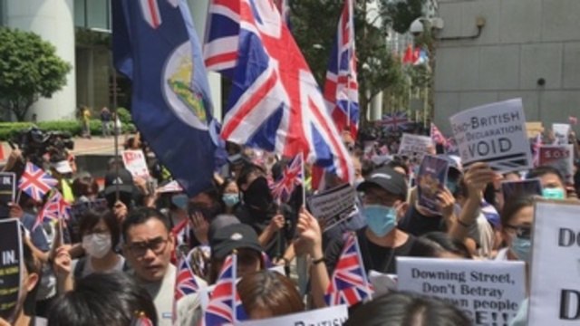 Centenares de hongkoneses piden a Reino Unido que apoye la lucha democrática