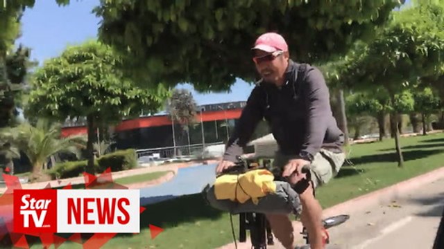 Cycling around the world for underprivileged cancer-stricken children