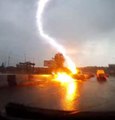 Terrifying moment lightning strikes car TWICE