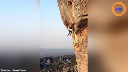 Il escalade une montagne à la force de ses bras, sans aucune sécurité !
