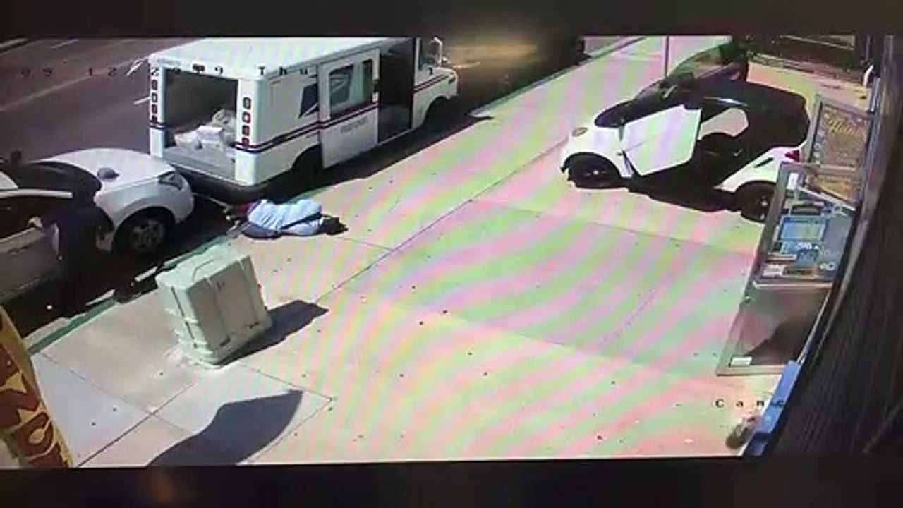 Car Slams into Postal Worker