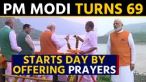 PM Modi turns 69, starts his day by offering prayers at Narmada River in Gujarat | OneIndia News