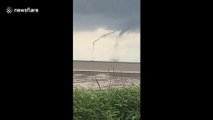 Rare double waterspout spotted swirling off Vietnam coast