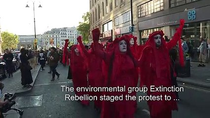 Environmental group Extinction Rebellion mark end of London fashion week with "funeral procession"