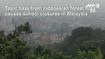 Toxic haze closes Malaysia schools
