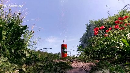 Ukrainian scientist ignites and melts soda can using 200 sparklers