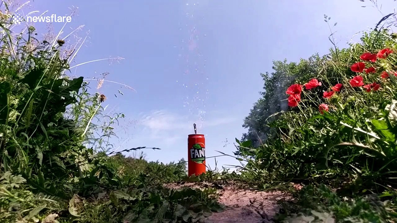 Ukrainian scientist ignites and melts soda can using 200 sparklers
